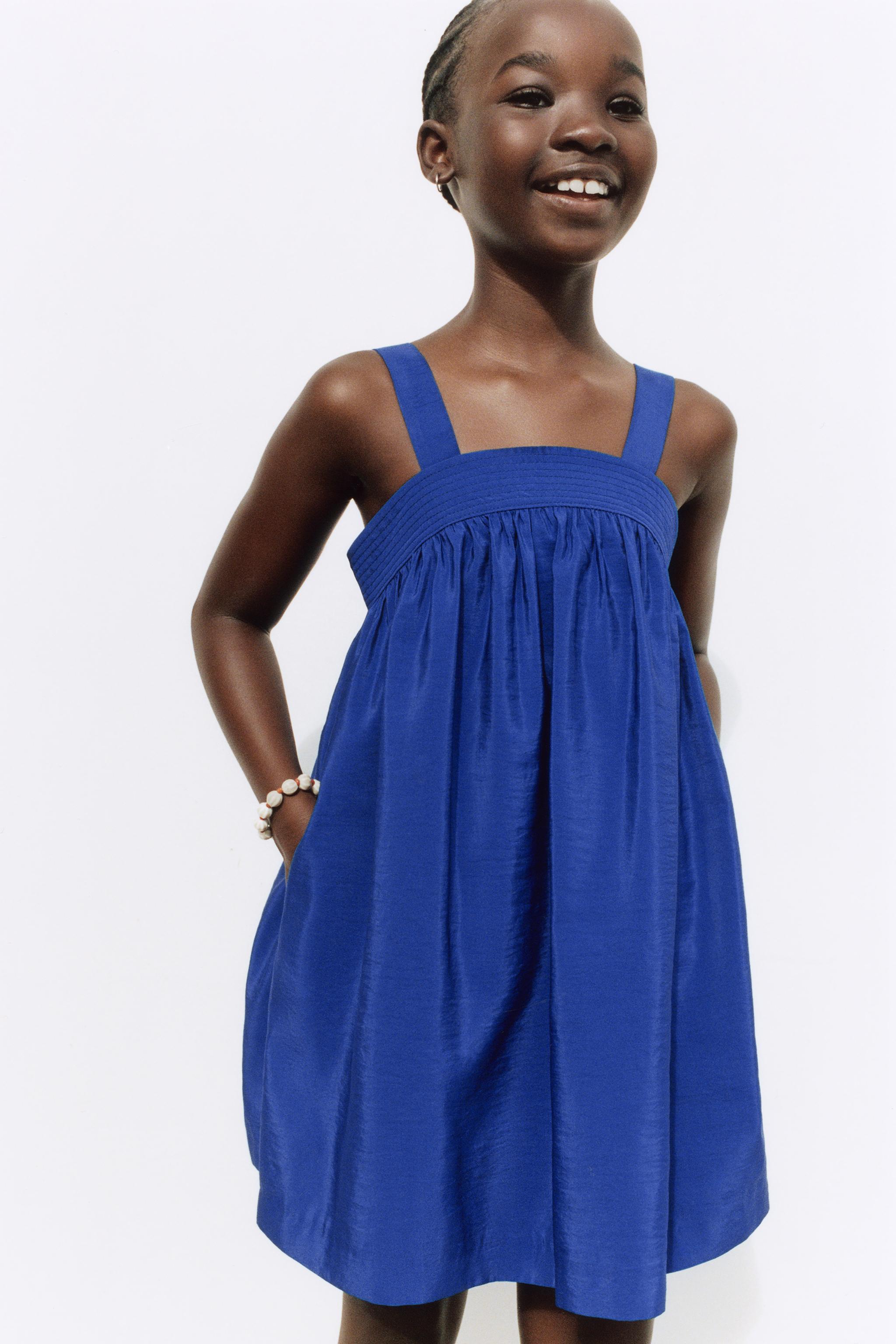 ROBE EN POPELINE À PLIS